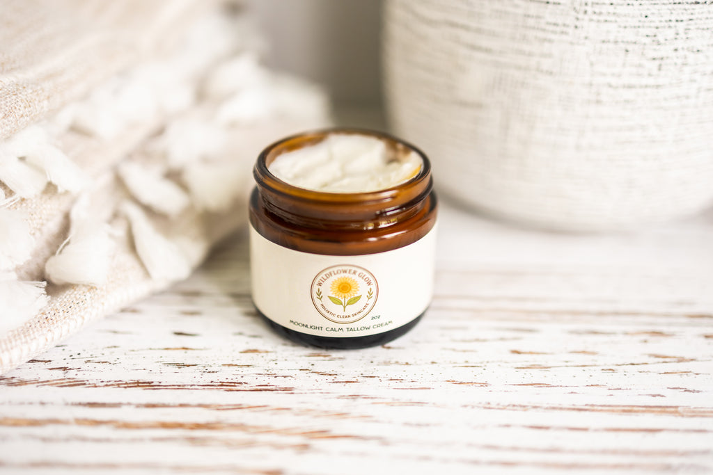 Jar of cream with a visible brand logo on a wooden surface